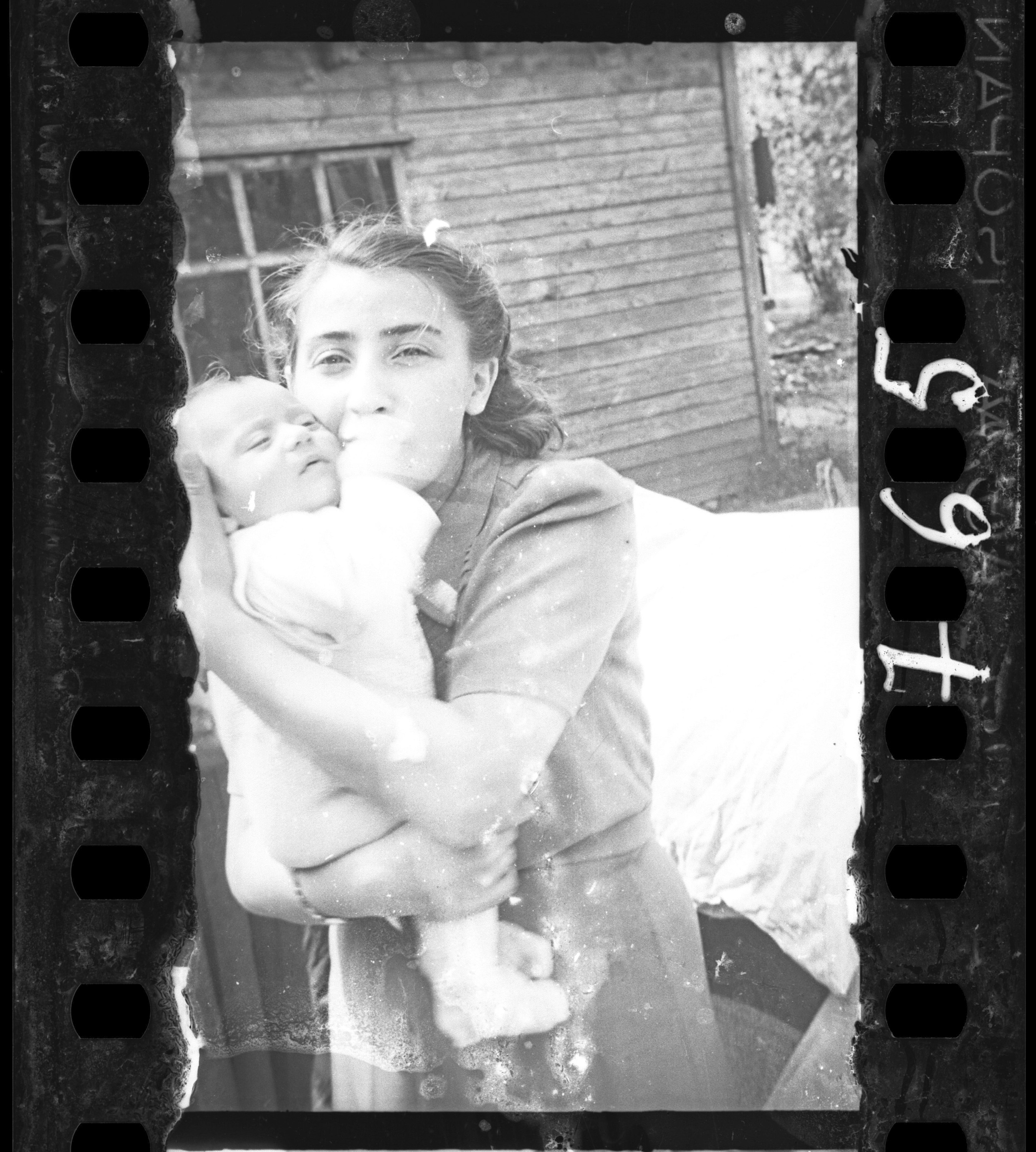 Jewish policeman’s family: mother with infant. Henryk Ross (Polish, born in 1910-1991). Jewish policeman’s family: mother with infant. Henryk Ross (Polish, born in 1910-1991).